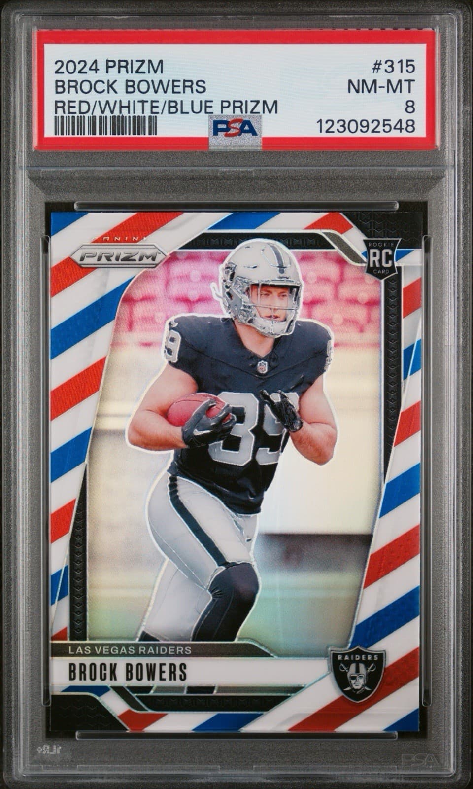 2024 Panini Prizm - Rookies Brock Bowers #315 Red White & Blue Prizm (RC). PSA 8